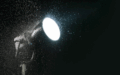 a Nanlux Evoke 2400B Bi-Color LED light shining through the rain